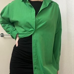 Green button up shirt